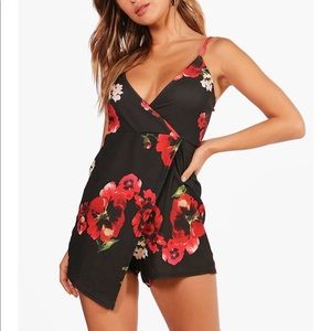 Black asymmetrical romper, new very flattering